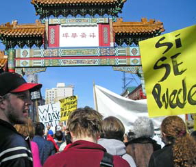 Immigration March passes through Chinatown, Portland, Oregon, March 4, 2006.